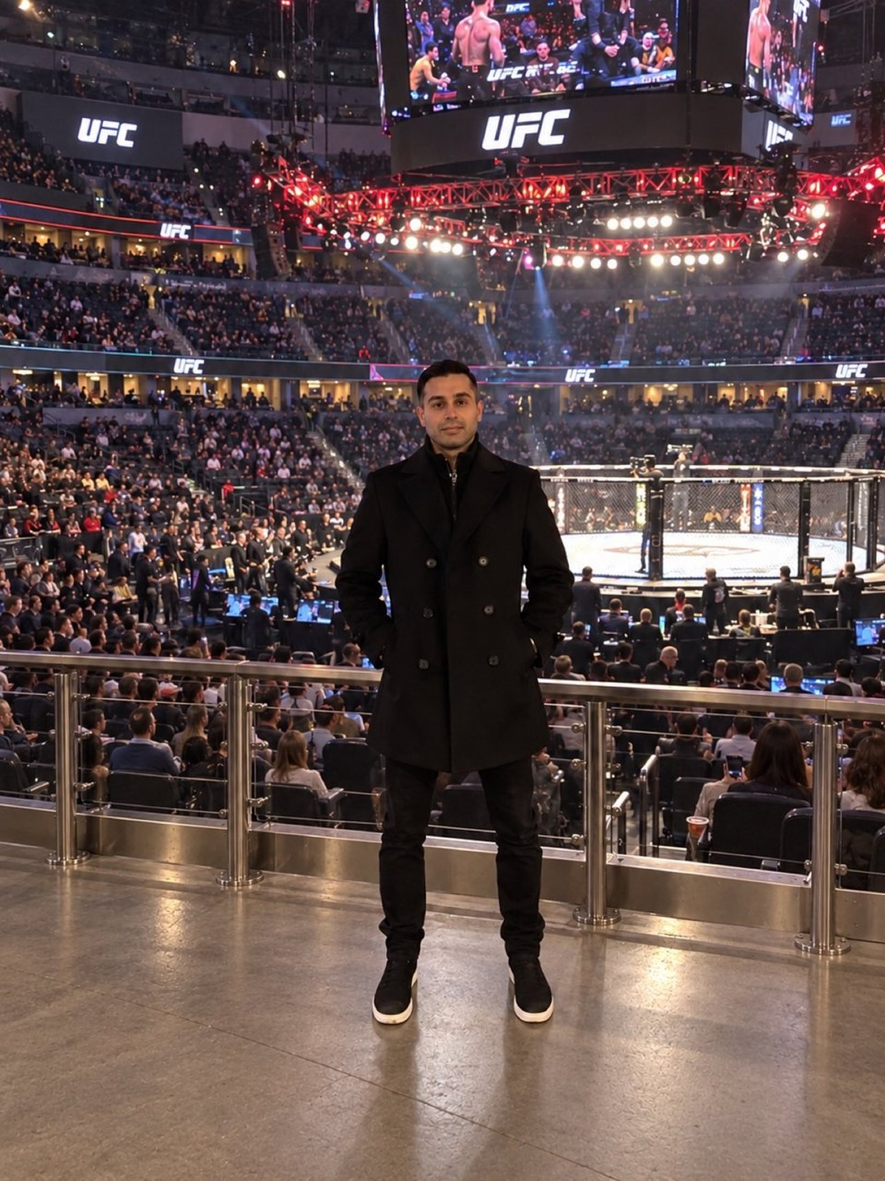 Mah Ghasemi at a kickboxing event in a packed arena