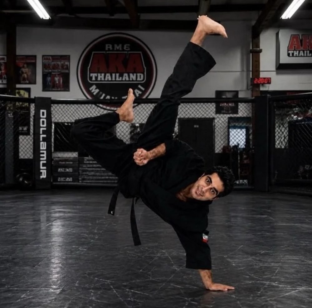 Mah Ghasemi performing a flying kick at AKA Thailand